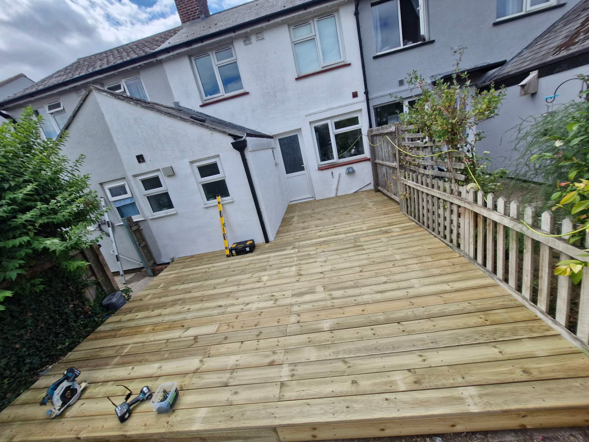 Finished large garden deck transforming the rear of a terraced home