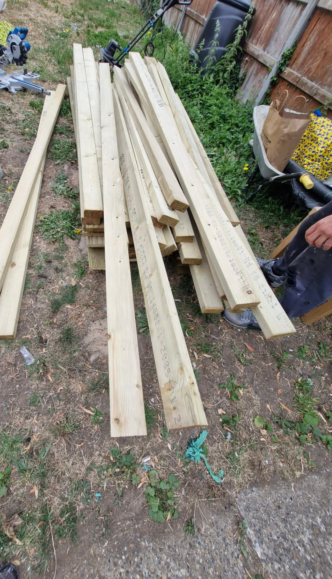 Treated timber joists and decking boards delivered ready for a new deck build