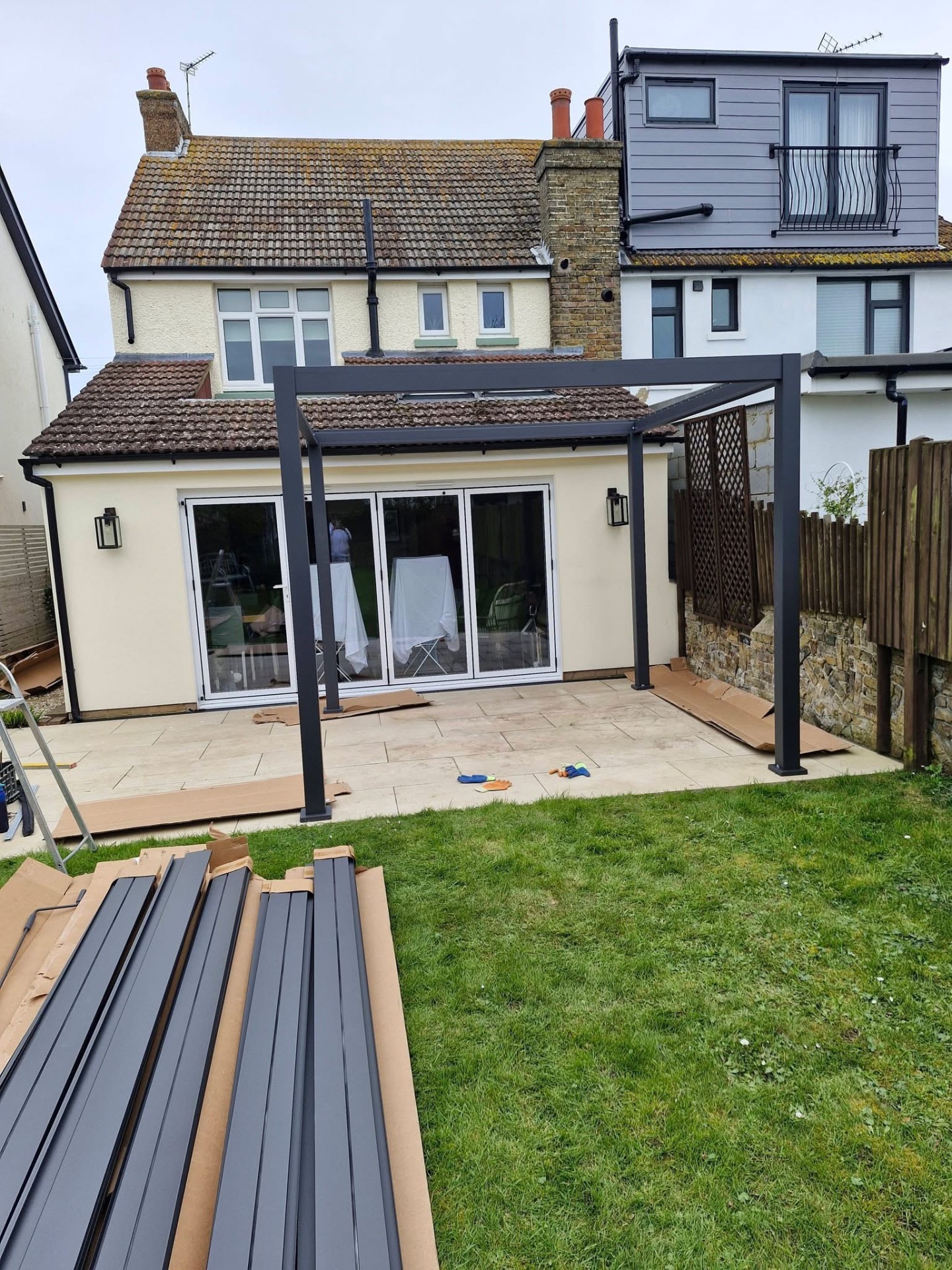 Aluminium pergola frame fitted to rear of home during install